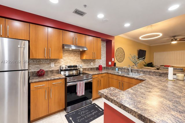5900 W Sample Rd 202, Coral Springs, FL 33067