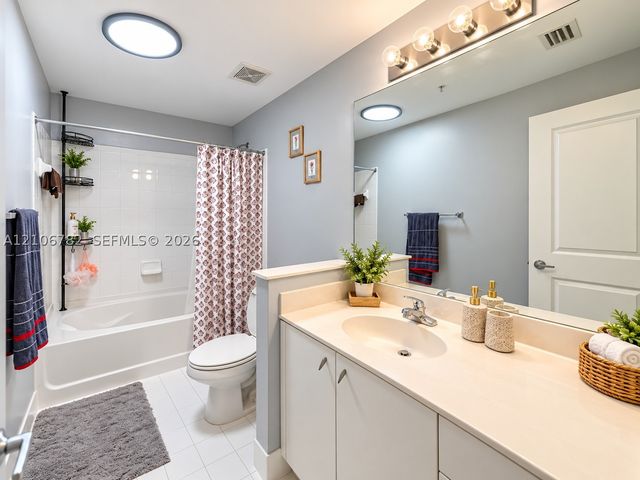 5900 W Sample Rd 202, Coral Springs, FL 33067
