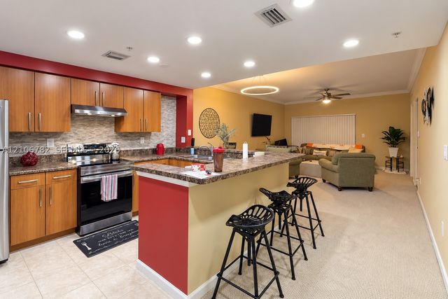 5900 W Sample Rd 202, Coral Springs, FL 33067