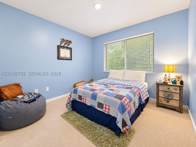 5900 W Sample Rd 202, Coral Springs, FL 33067