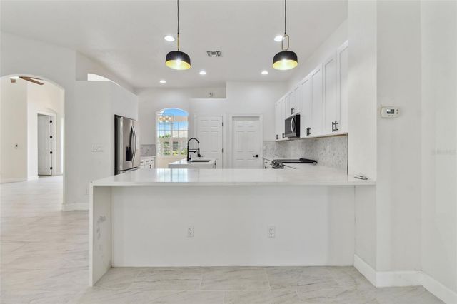 13792 LONG LAKE LANE, Port Charlotte, FL 33953