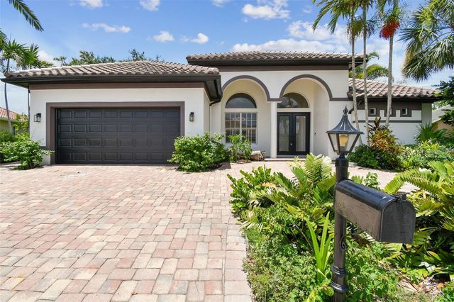 13792 LONG LAKE LANE, Port Charlotte, FL 33953