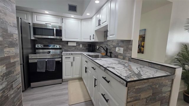 2831 Somerset Drive 105, Lauderdale Lakes, FL 33311