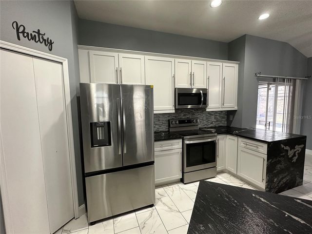 6498 ROYAL TERN STREET, Orlando, FL 32810