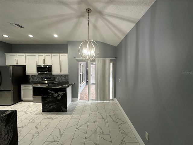 6498 ROYAL TERN STREET, Orlando, FL 32810