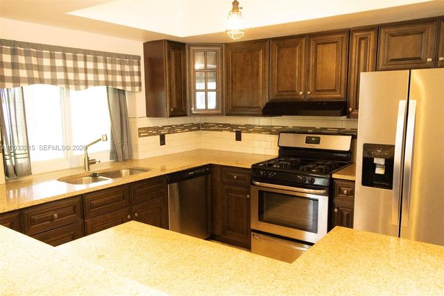 9880 NW 24th Place, Sunrise, FL 33322