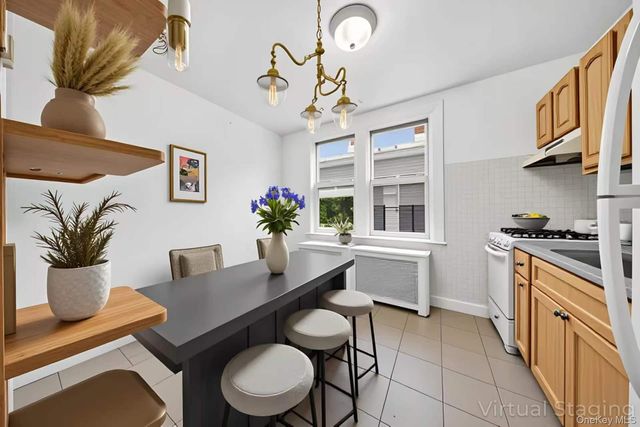 95-11 42nd Avenue, Elmhurst, NY 11373