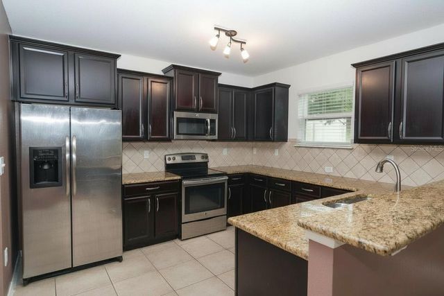 5909 WINDSONG OAK DRIVE, Leesburg, FL 34748