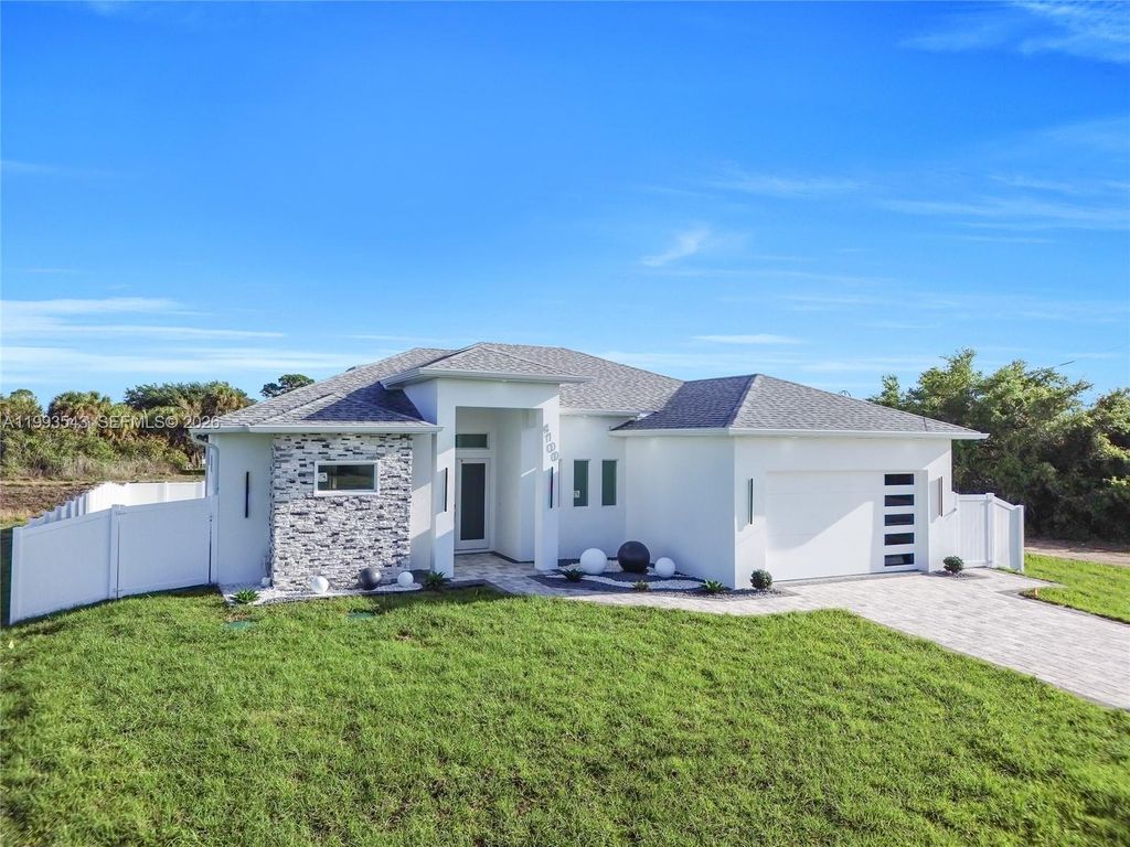 Image 1 of property listing at 4100 15TH ST SW, Lehigh Acres, FL 33976