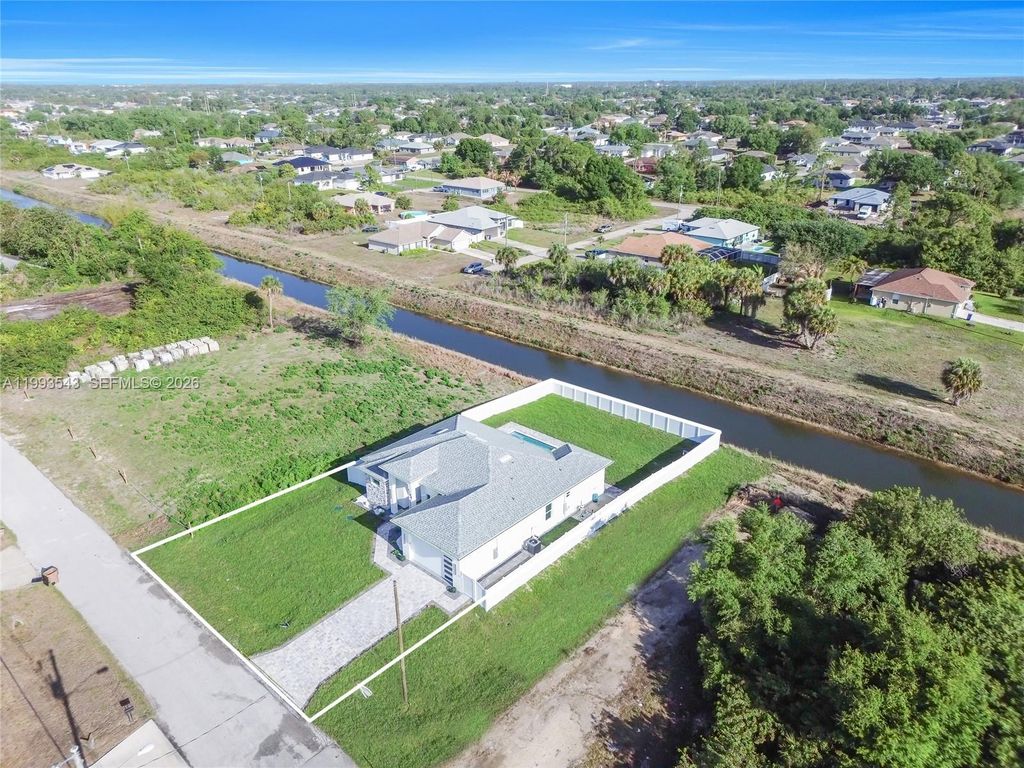 Image 58 of property listing at 4100 15TH ST SW, Lehigh Acres, FL 33976