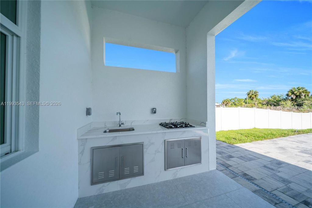 Image 6 of property listing at 4100 15TH ST SW, Lehigh Acres, FL 33976