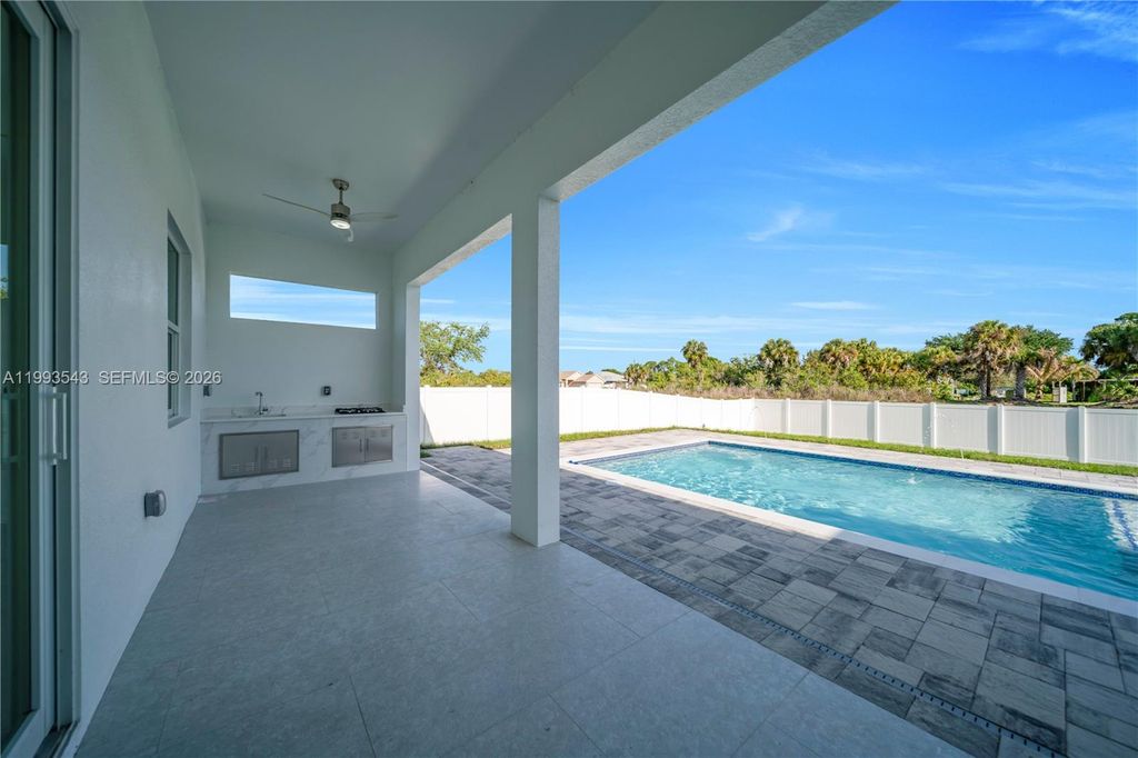 Image 8 of property listing at 4100 15TH ST SW, Lehigh Acres, FL 33976