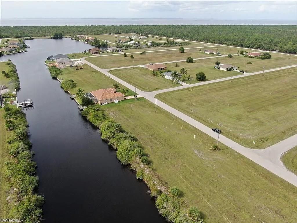 821 NW 33rd PL, CAPE CORAL, FL 33993 — exterior