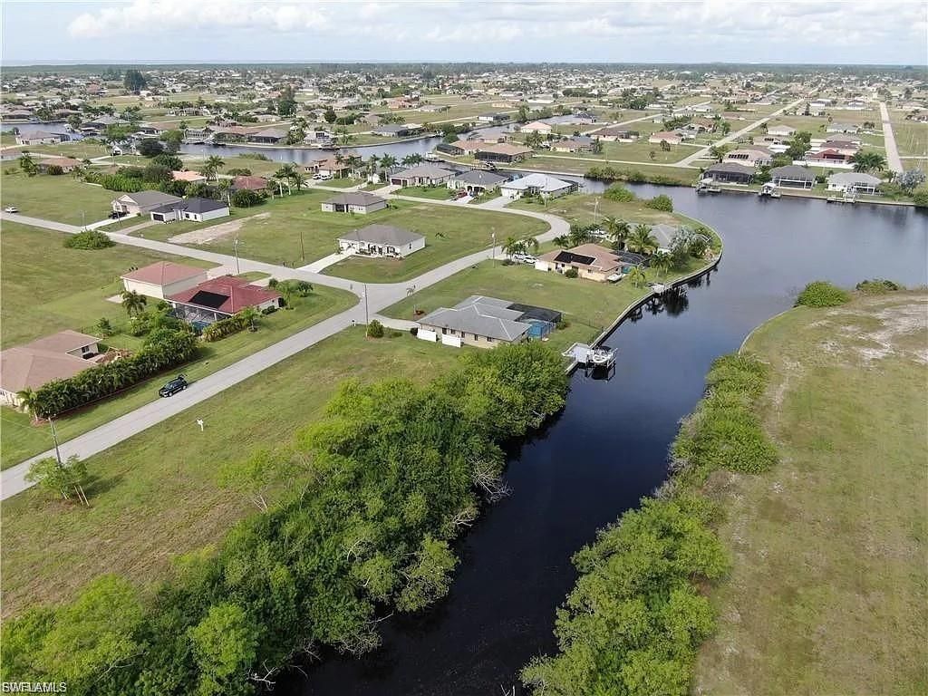 821 NW 33rd PL, CAPE CORAL, FL 33993 — photo 2