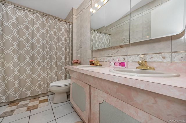 69-35 61st Road, Middle Village, NY 11379