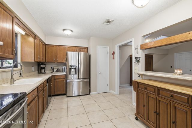 11850 TUMBLING OAKS Lane, Jacksonville, FL 32223