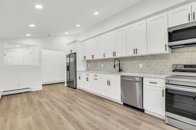 21 John Drive, Farmingville, NY 11738