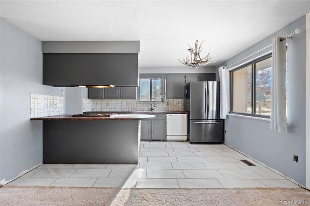 16030 W 75th Place, Arvada, CO 80007