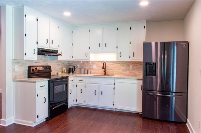 1077 Sawgrass Court SW, Lilburn, GA 30047