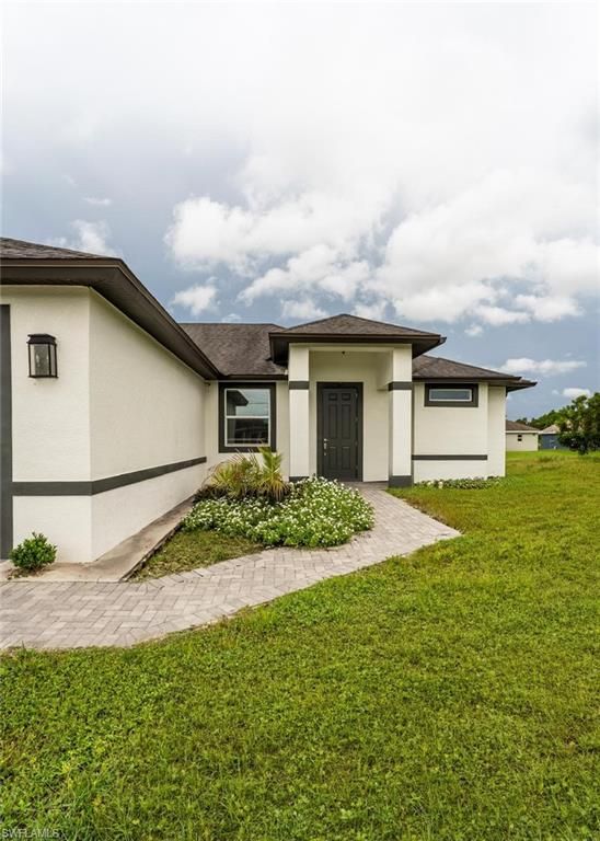2917 5th ST SW, LEHIGH ACRES, FL 33976 — photo 2
