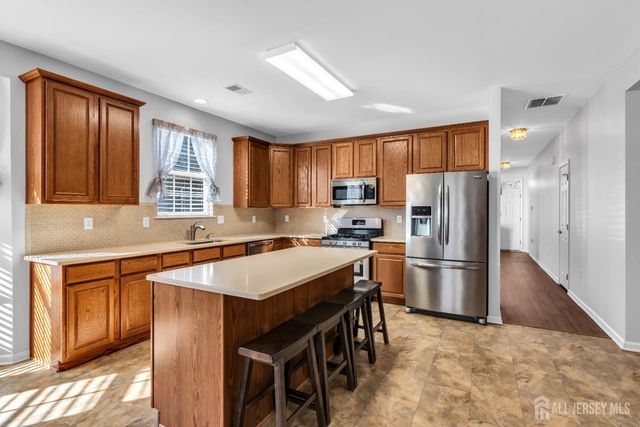 18 Hartack Road, Manalapan, NJ 07726