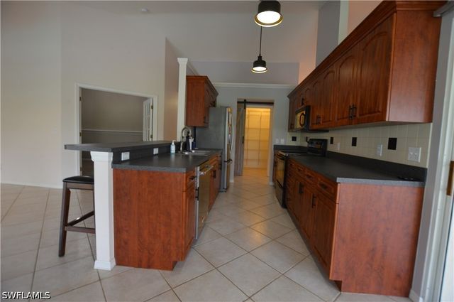 214 Palmetto Dunes CIR, Naples, FL 34113