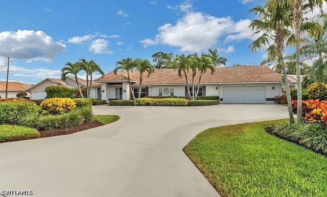 214 Palmetto Dunes CIR, Naples, FL 34113