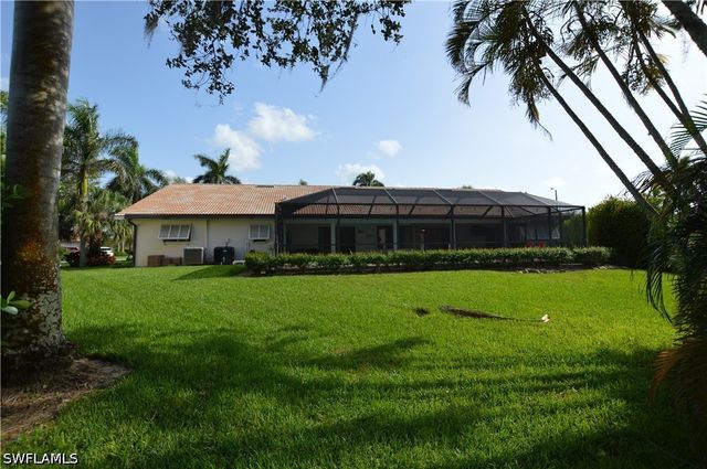 214 Palmetto Dunes CIR, Naples, FL 34113