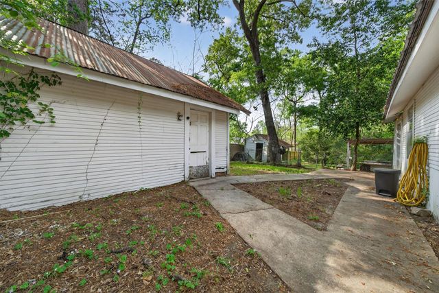 15185 Travis Lane, Willis, TX 77378