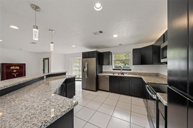 507 Magnolia Bend, Roman Forest, TX 77357