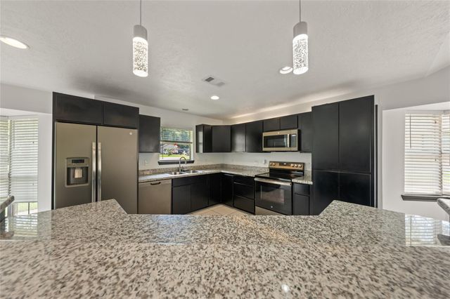 507 Magnolia Bend, Roman Forest, TX 77357