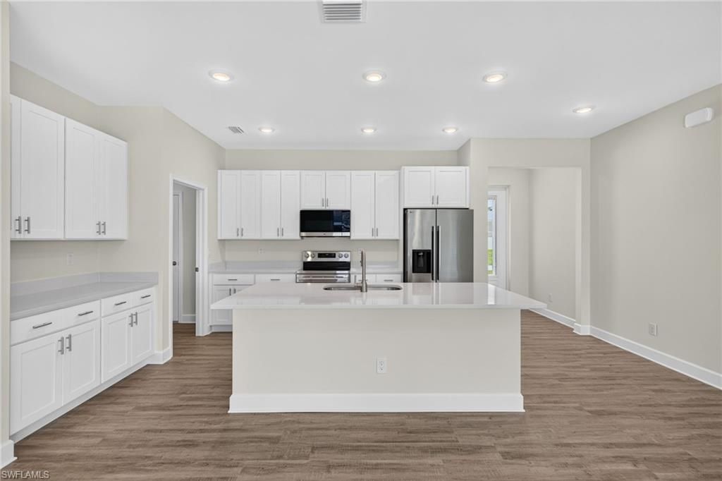 Image 10 of property listing at 24 NW 30th TER, Cape Coral, FL 33993