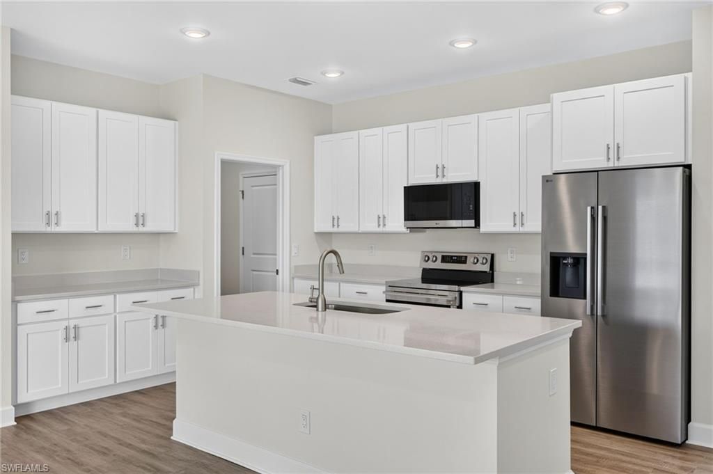 Image 2 of property listing at 24 NW 30th TER, Cape Coral, FL 33993