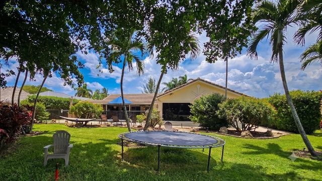 244 Walton-Heath Drive, Atlantis, FL 33462