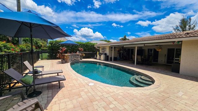 244 Walton-Heath Drive, Atlantis, FL 33462