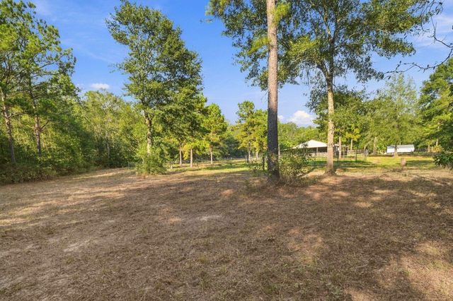 7049 Pine Shadows Road, Cleveland, TX 77328