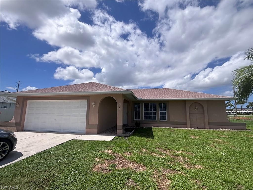 216 SE Santa Barbara PL, CAPE CORAL, FL 33990 — exterior
