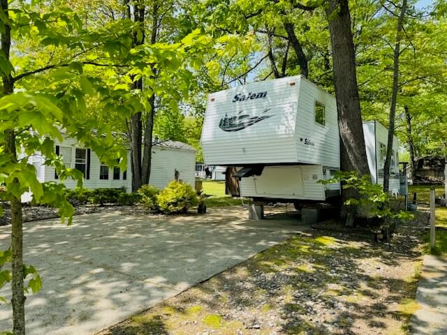 2757 Owens Unit 205 Drive, Houghton Lake, MI 48629