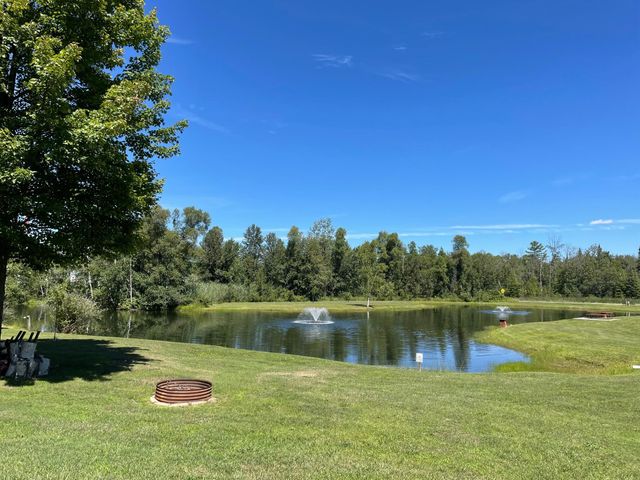 2757 Owens Unit 205 Drive, Houghton Lake, MI 48629