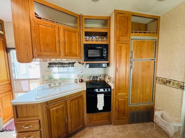 2757 Owens Unit 205 Drive, Houghton Lake, MI 48629