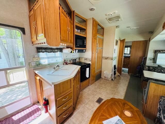 2757 Owens Unit 205 Drive, Houghton Lake, MI 48629