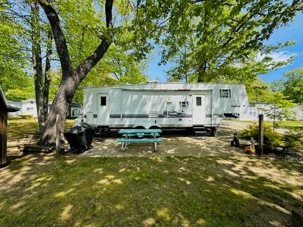 2757 Owens Unit 205 Drive, Houghton Lake, MI 48629