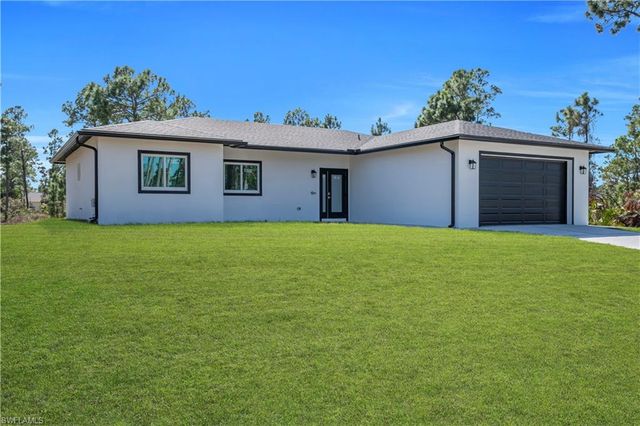 828 Genoa AVE S, Lehigh Acres, FL 33974