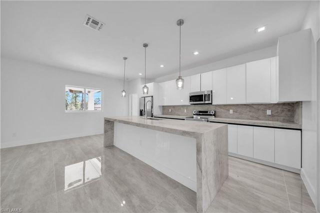 828 Genoa AVE S, Lehigh Acres, FL 33974