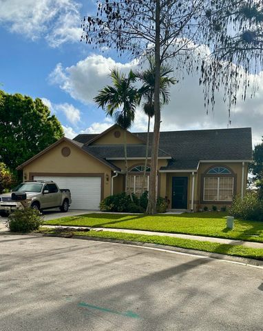 112 Princess Court, Royal Palm Beach, FL 33411