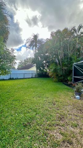 112 Princess Court, Royal Palm Beach, FL 33411
