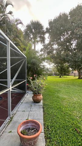 112 Princess Court, Royal Palm Beach, FL 33411