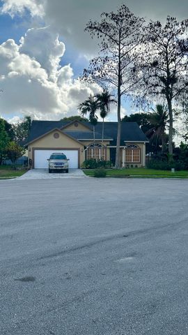 112 Princess Court, Royal Palm Beach, FL 33411