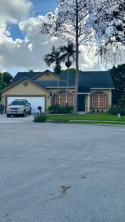 112 Princess Court, Royal Palm Beach, FL 33411