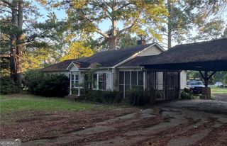 83 Woodstock Road, Roswell, GA 30075